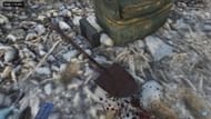 A bloody shovel discarded in Sandy Shores (Image via Sportskeeda)